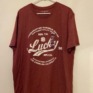 Lucky Brand Men's Maroon Graphic Tee, has tiny hole